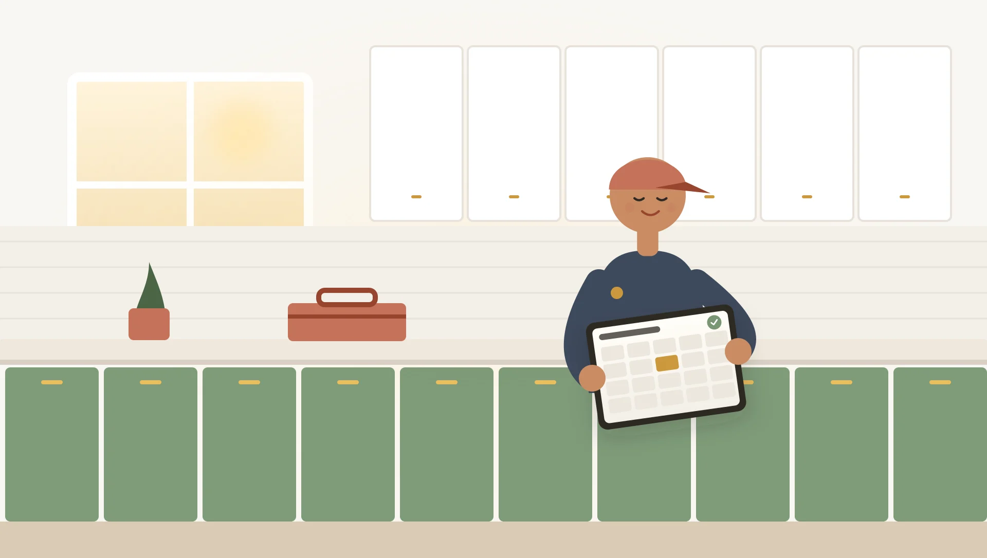 Technician on a job in a bright kitchen